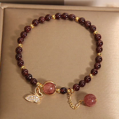 Showcasing garnet butterfly jewelry