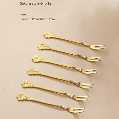 Gold stainless steel fruit fork stand view 1