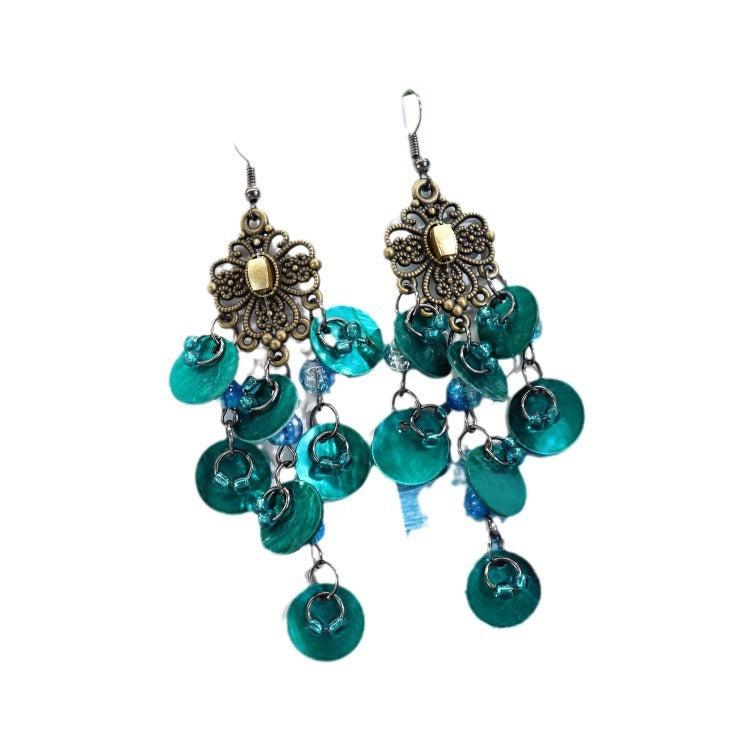 Elegant mother-of-pearl earrings on model