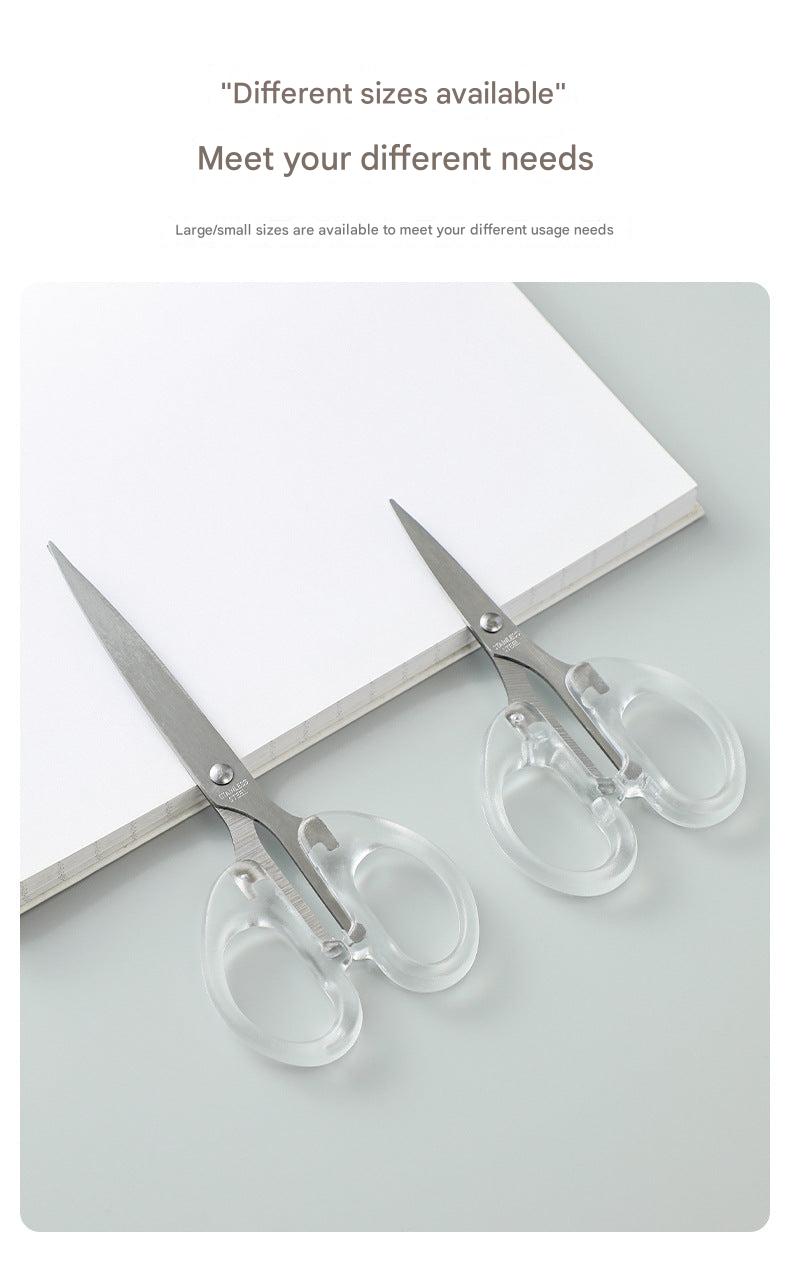 Various sizes of professional scissors displayed