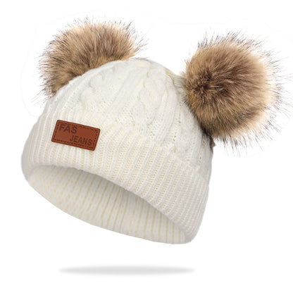 Colorful pom-pom knit hat for children