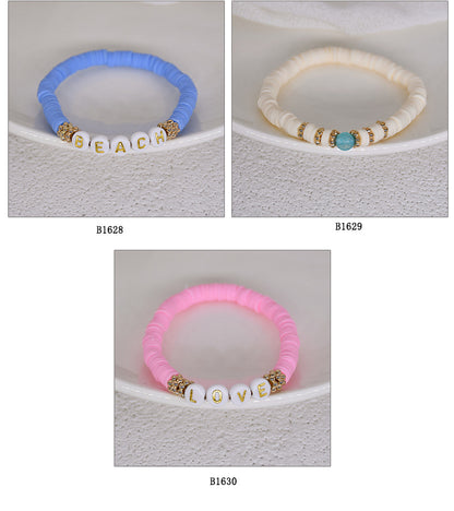 Colorful charm bracelet worn by a model outdoors - image 5