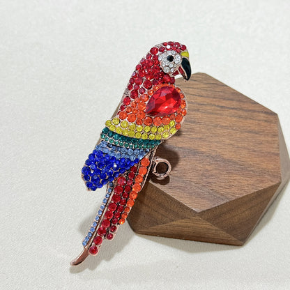 Vintage parrot brooch on a jacket