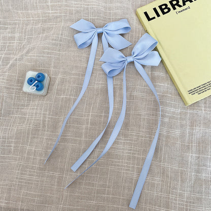 Charming bow hair clip in black