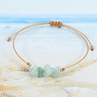 Handcrafted colorful crystal bracelet on a white background