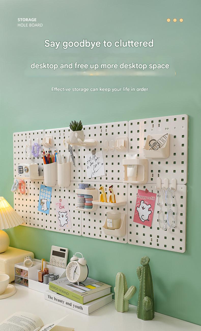 Dorm room setup with pegboard organizer