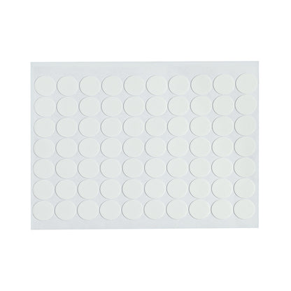 Multiple adhesive dots on a surface