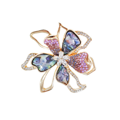 Close-up of rhinestone brooch detail