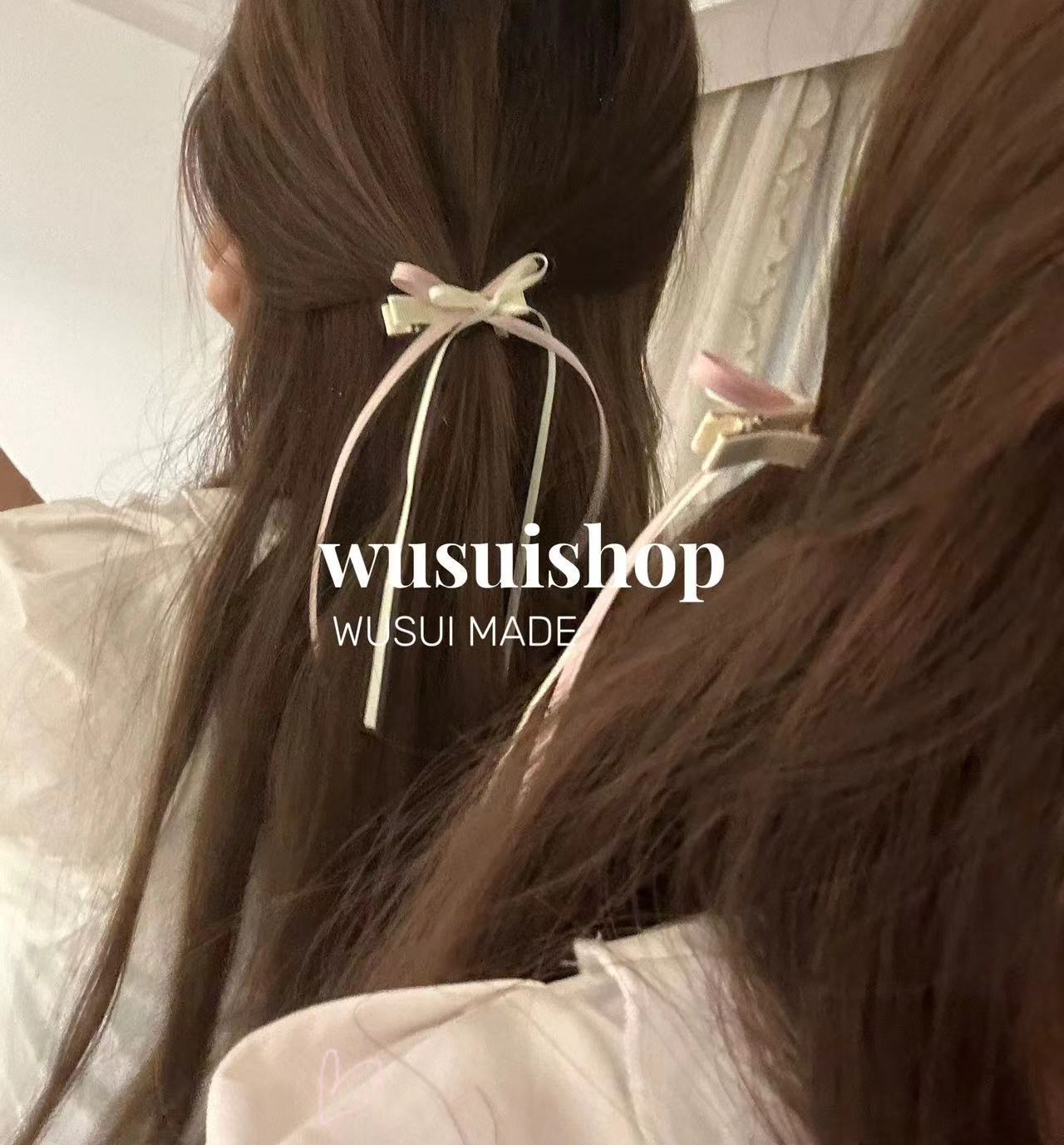 Blue bow hair clip styled on child's hair