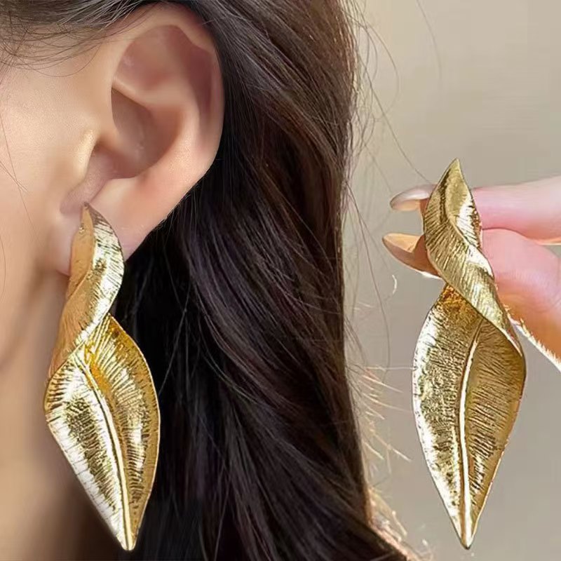 Silver leaf statement earrings