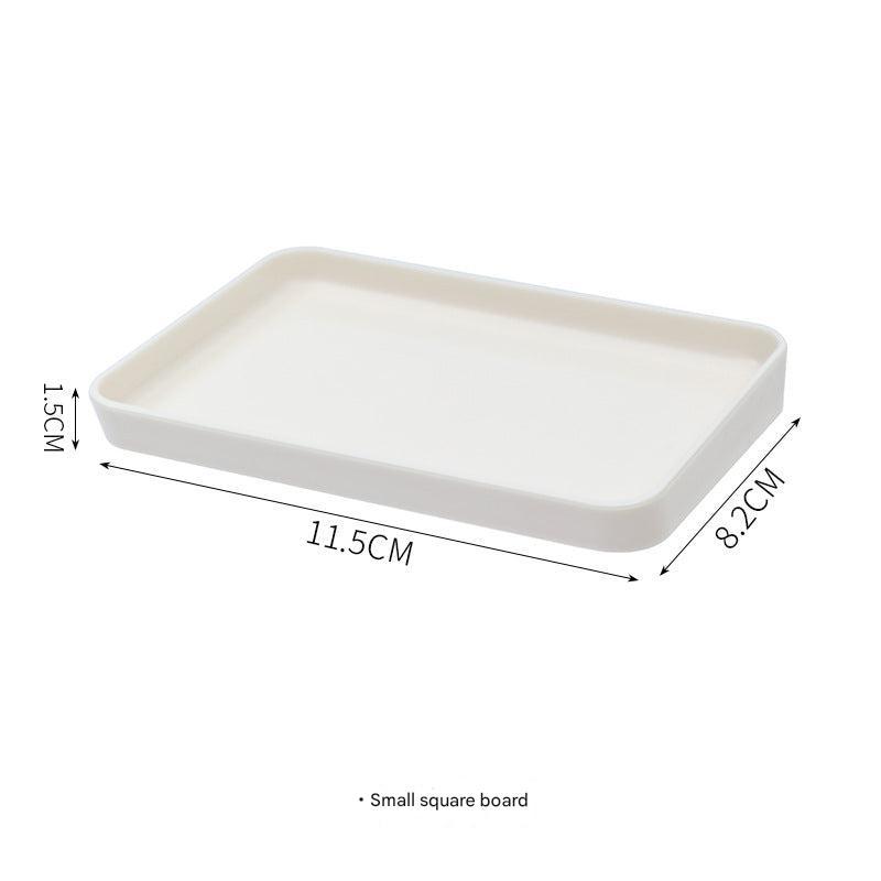 Image of wall-mounted pegboard organizer with various compartments