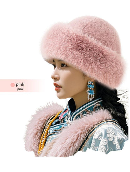 Pink knitted winter hat for women close-up