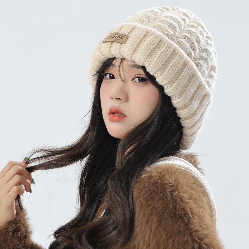 Stylish beige knit hat with matching scarf