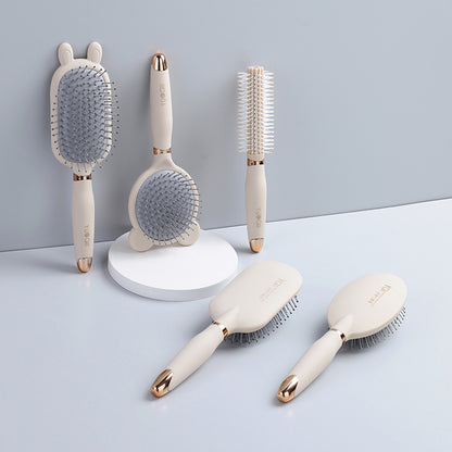 Detangling hair brush on a vanity