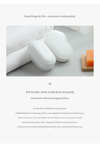 Ergonomic cleaning brush for gentle fabric care