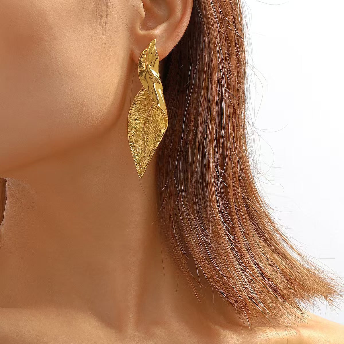 Silver leaf statement earrings