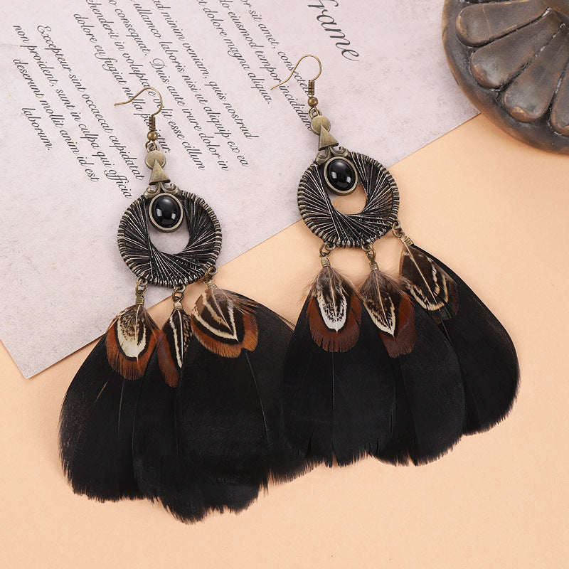 Bohemian Peacock Feather Tassel Earrings - Image 1