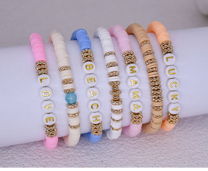 Close-up of colorful geometric charm bracelet - image 2