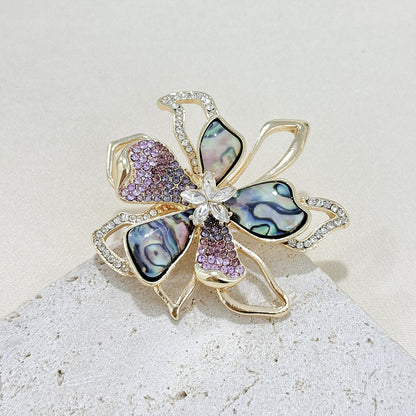 Close-up of rhinestone brooch detail