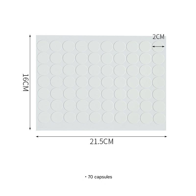 Close-up of reusable acrylic adhesive dots