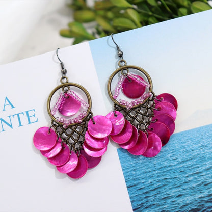 Colorful long tassel earrings displayed