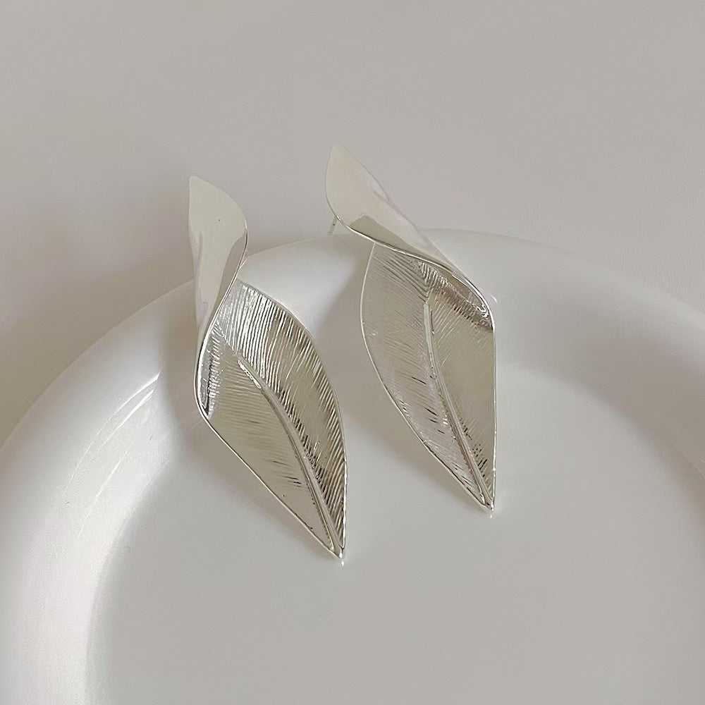 Silver leaf statement earrings
