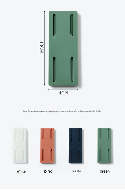 Wall-mounted power strip organizer in blue