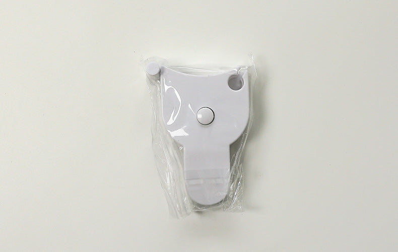 Measuring tape displayed with fitness equipment