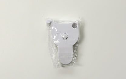 Measuring tape displayed with fitness equipment