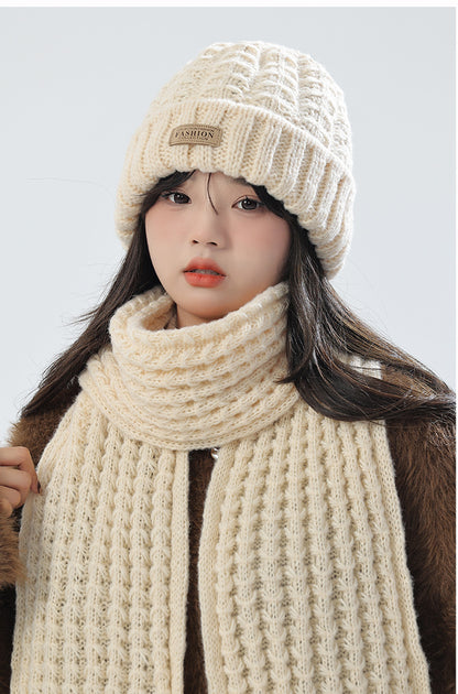 Stylish beige knit hat with matching scarf