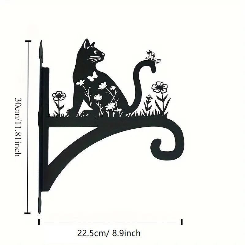 Iron flower basket mounted on a wall with plants