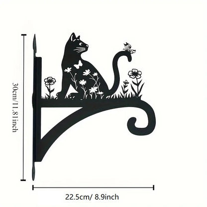 Iron flower basket mounted on a wall with plants