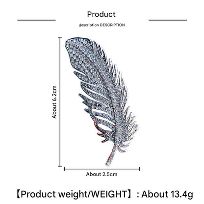Elegant feather brooch on jacket
