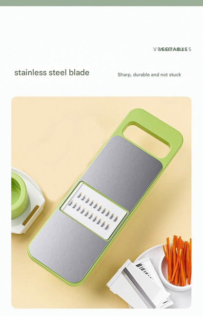 hand holding the grater over a bowl