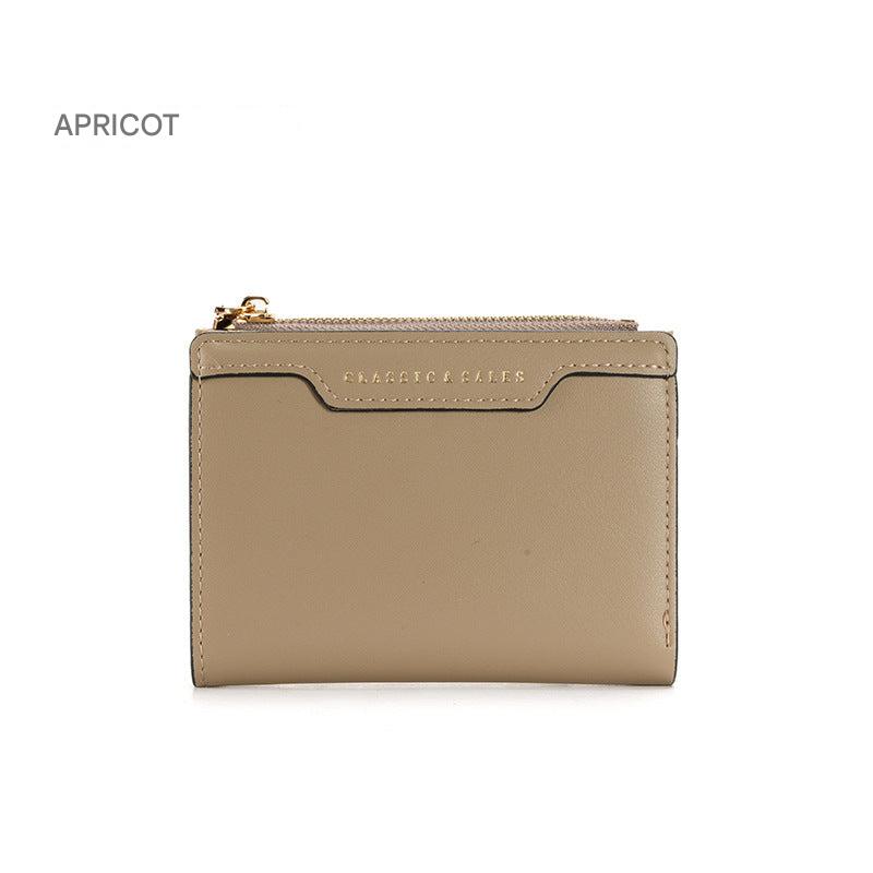 Red compact women's wallet with zipper