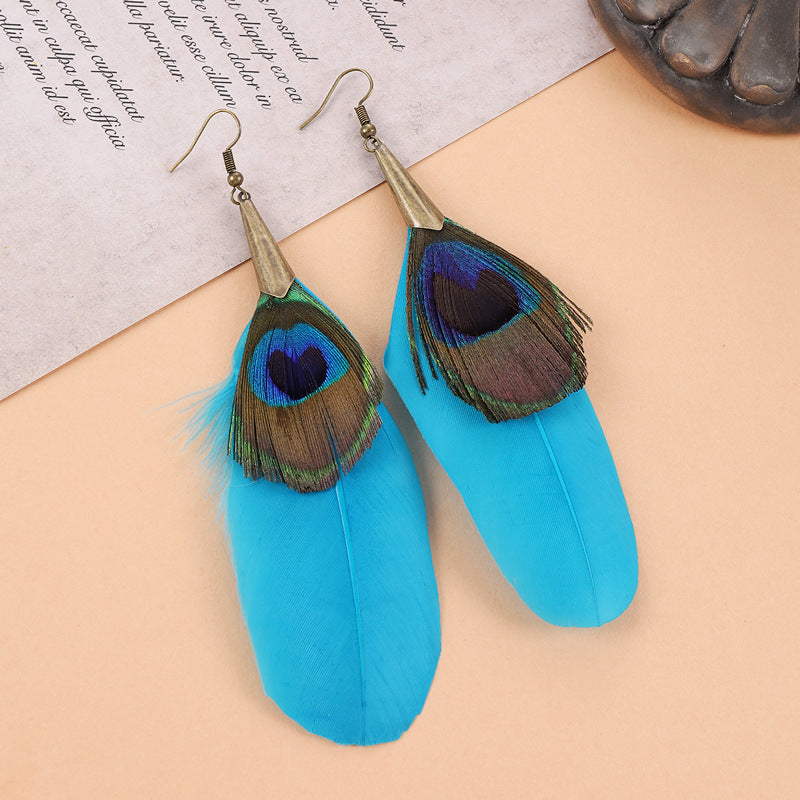 Bohemian Peacock Feather Tassel Earrings - Image 1