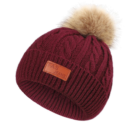 Colorful pom-pom knit hat for children
