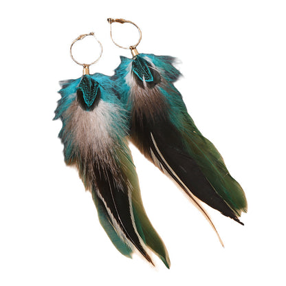 Close-up of natural feather earrings for women