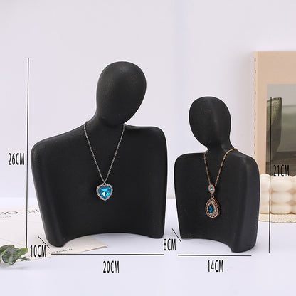 resin figure jewelry stand minimalistic design