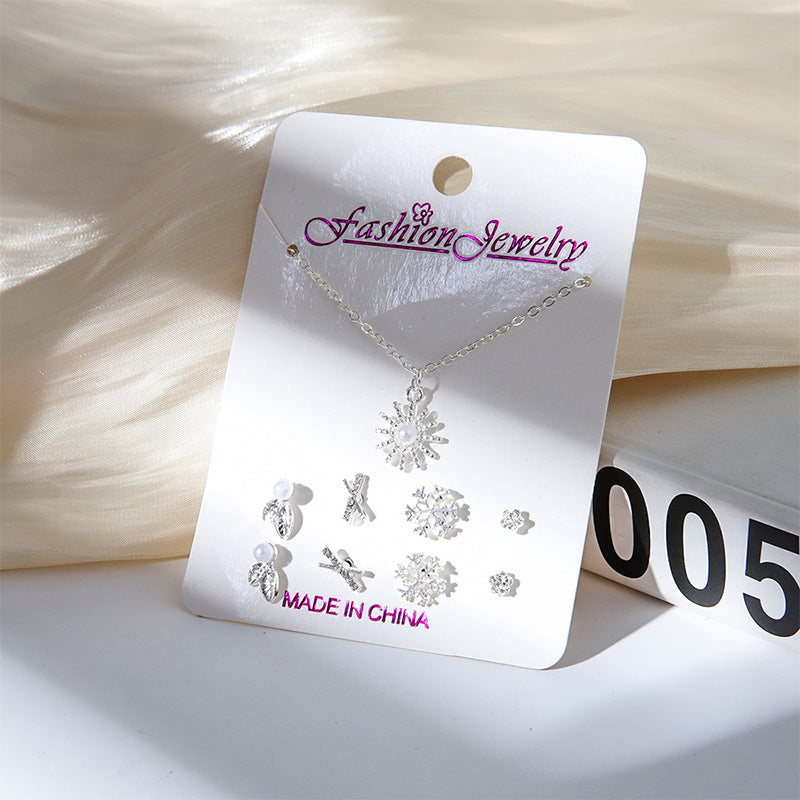 Gold crystal snowman earrings image