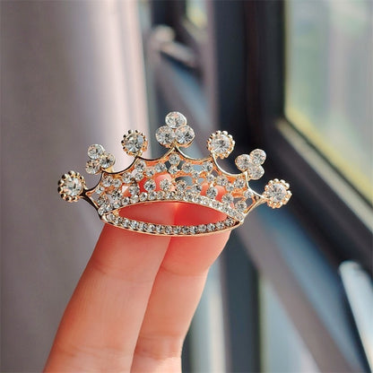 Gold crown brooch with rhinestones