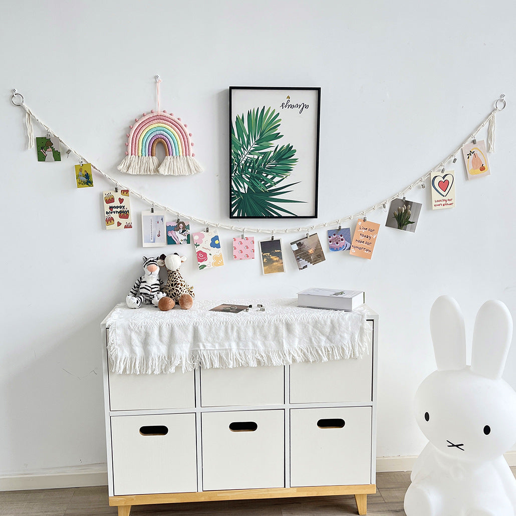 Vertical display of artwork on string with clips - image 5