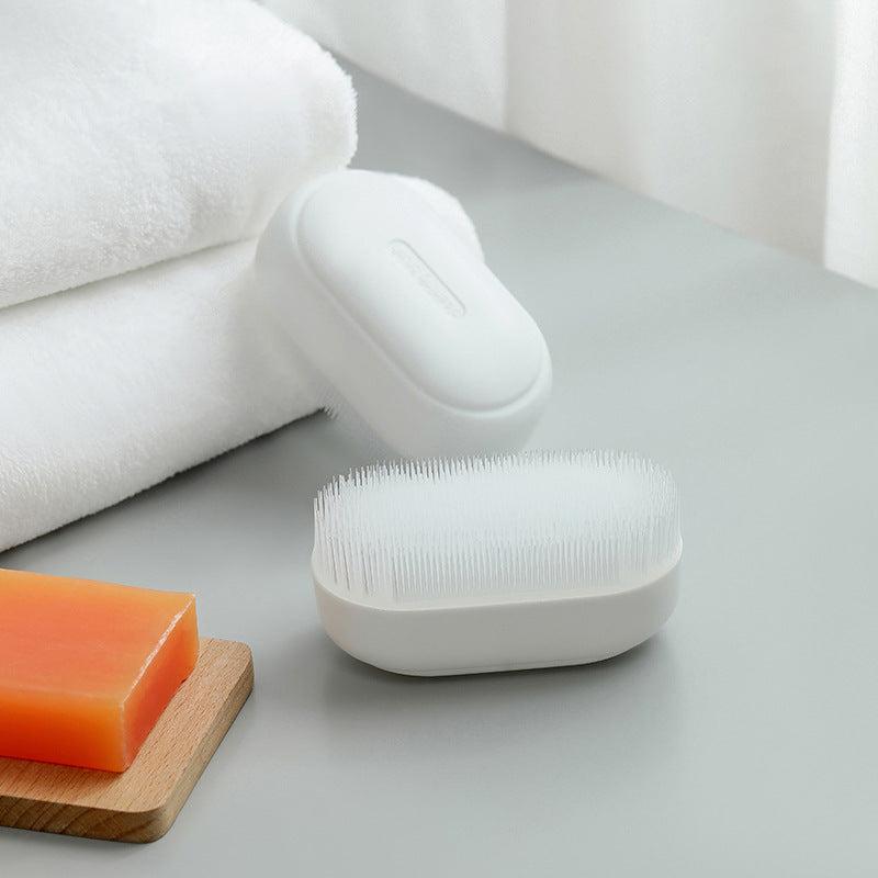 Ergonomic cleaning brush for gentle fabric care