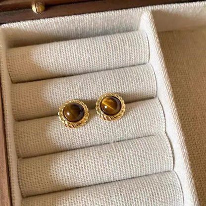 Elegant metal earrings with round design