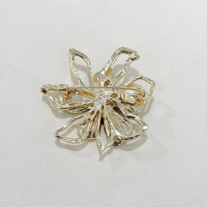 Rhinestone bowknot brooch on a coat