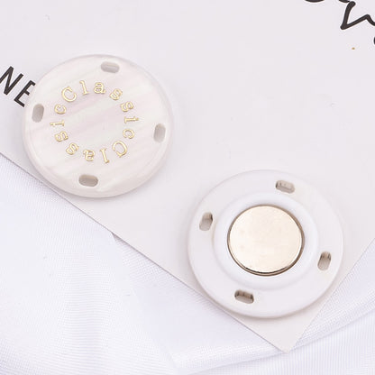 Detachable magnetic closure button